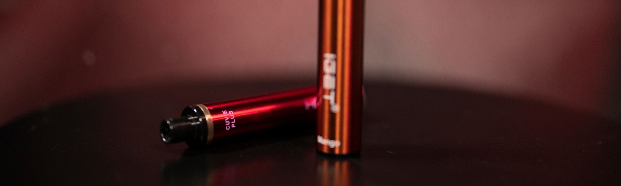 2 red vape devices