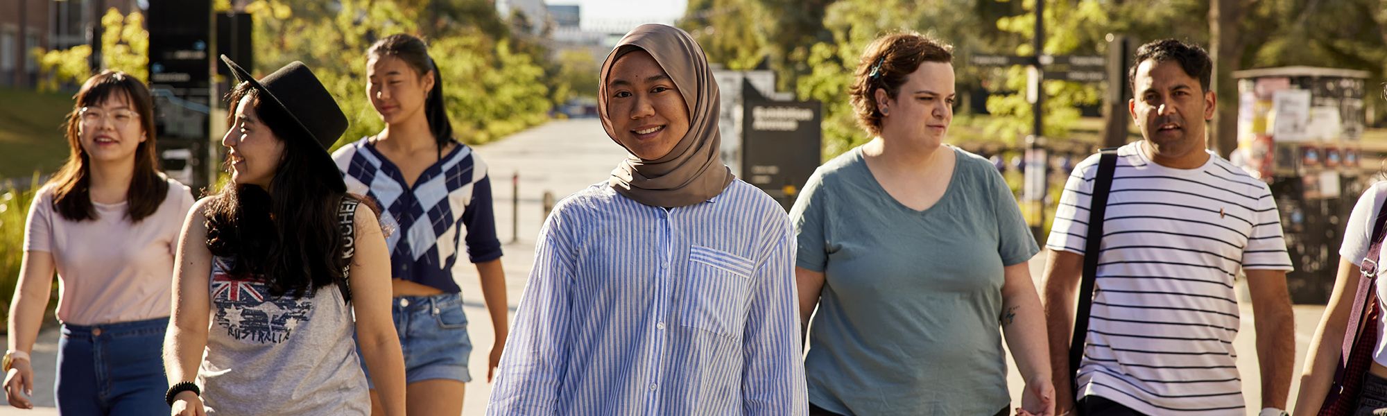 Few student walking in the ANU campus
